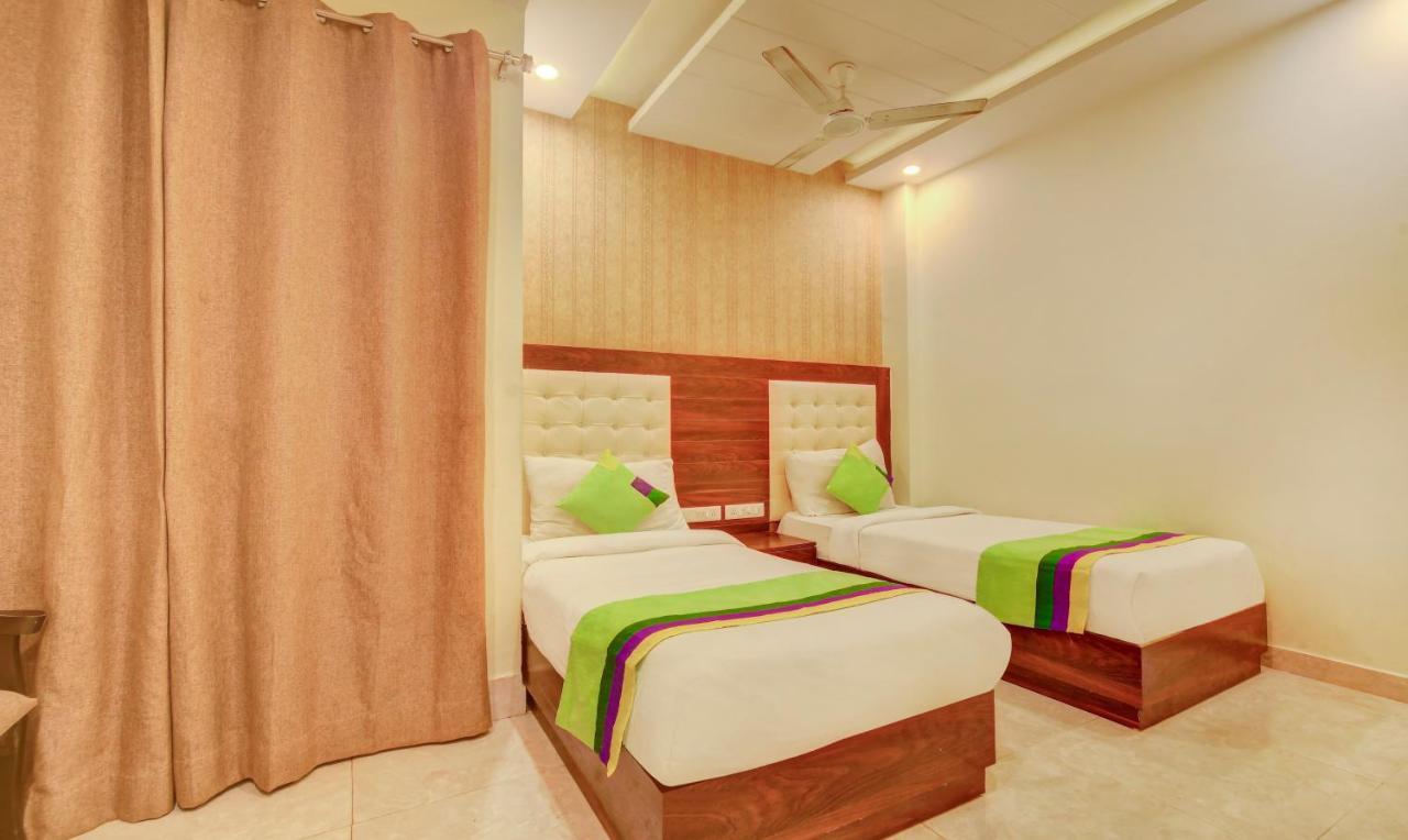 Отель Treebo G K Residency Near Dehradun Railway Station Экстерьер фото
